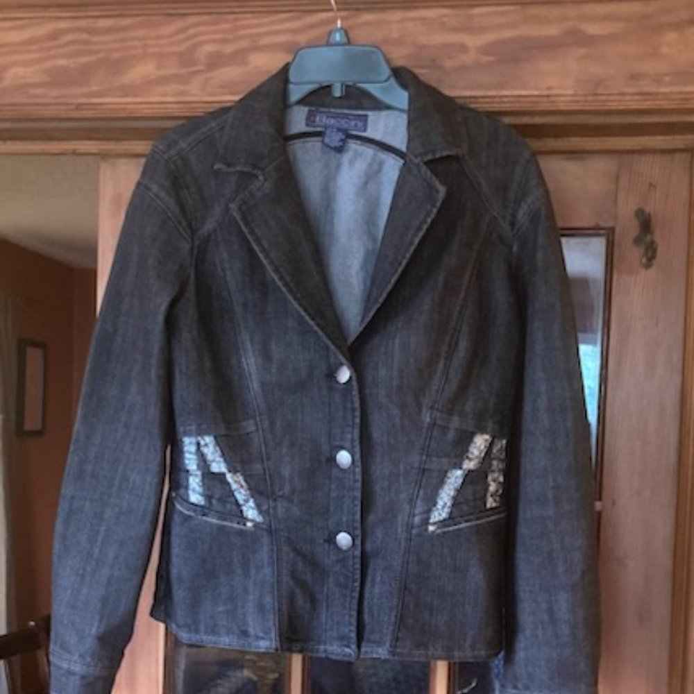 Black denim fitted jacket.  Adorned with silver striping.